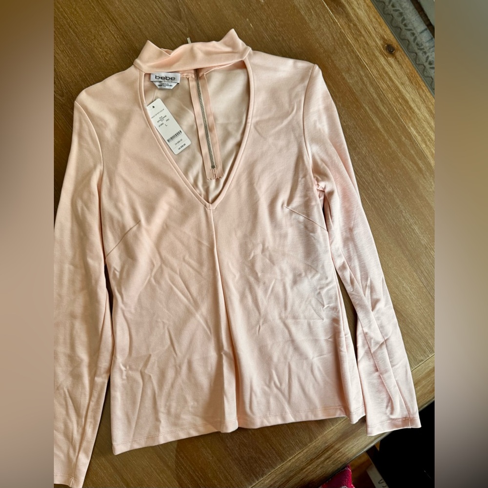 New Bebe chick top size large bebe Pink V-Neck Pullover Top